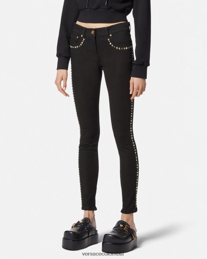 mujer jeans ajustados con tachuelas de Medusa Versace negro 2RP40F214 ropa